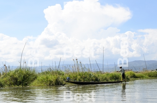Fisherman catches fish on Inle Lake, Burma (Myanmar).