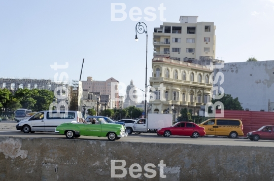 American classic cars driving on the street in Havana