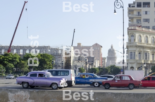 American classic cars driving on the street in Havana