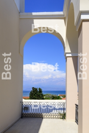 Arch terrace on summer in luxury resort with beautiful Mediterranean sea view.
