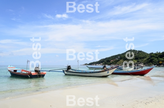 Boats waiting for tourists on the beach