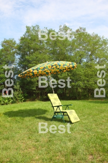 Deck chair with umbrella