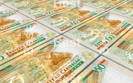 East Caribbean dollar bills stacked background