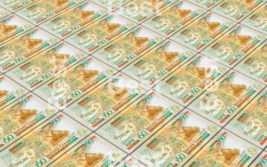 East Caribbean dollar bills stacked background