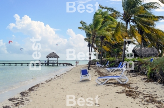 Empty beach chairs waiting for tourists in Cayo Guillermo