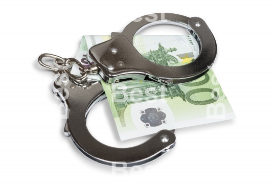 Euro banknotes and handcuffs