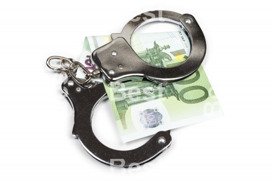 Euro banknotes and handcuffs