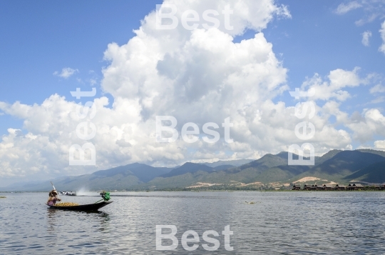 Farmer carrying paddy go home on Inle Lake