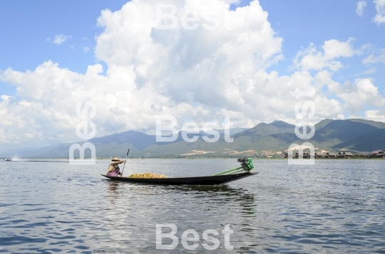 Farmer carrying paddy go home on Inle Lake