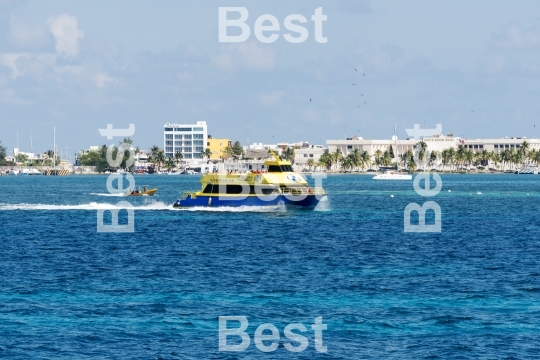 Ferry boat with tourists in Isla Mujeres