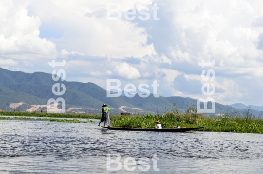 Fisherman catches fish on Inle Lake, Burma (Myanmar).