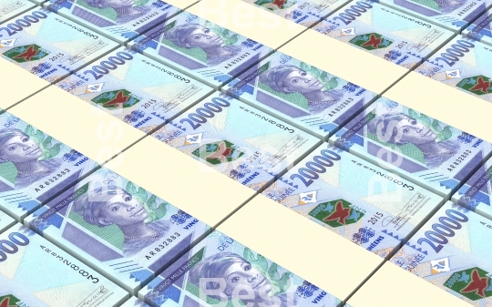 Guinean francs bills stacked background