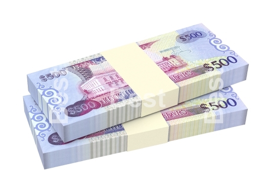 Guyanese dollars bills isolated on white background