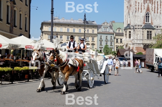 Horse-drawn carriage at City Square in Krakow