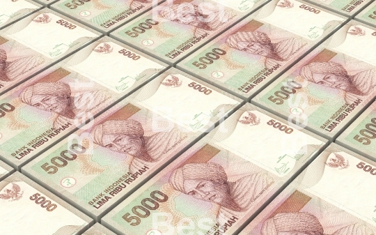 Indonesian rupiah bills stacks background.