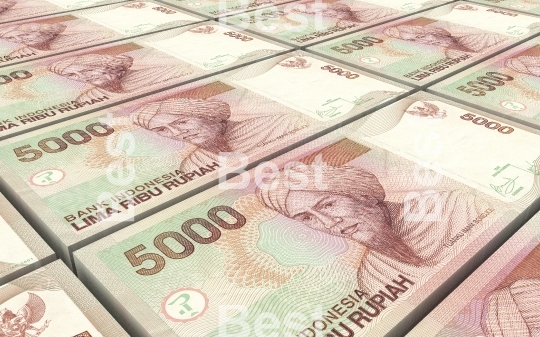 Indonesian rupiah bills stacks background.