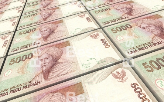 Indonesian rupiah bills stacks background.