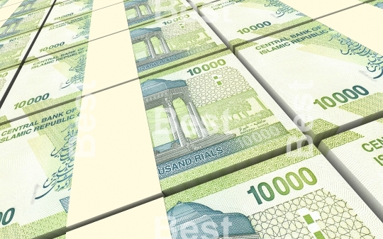 Iranian rials bills stacked background