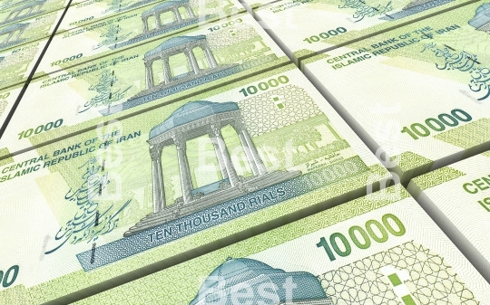 Iranian rials bills stacked background