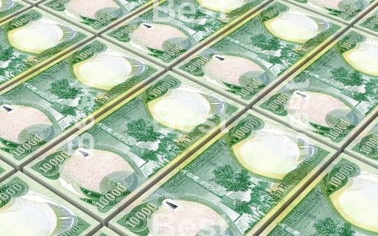 Iraqi dinars bills stacked background