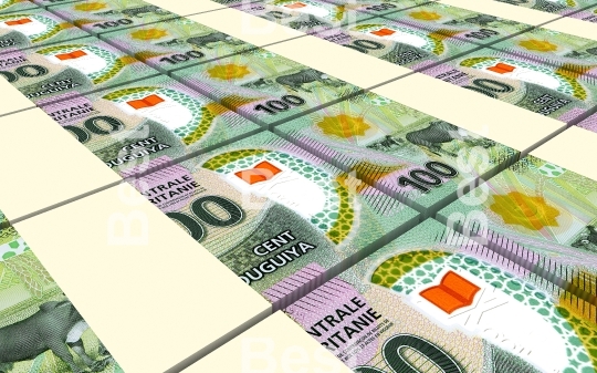 Mauritanian ouguiya bills stacks background