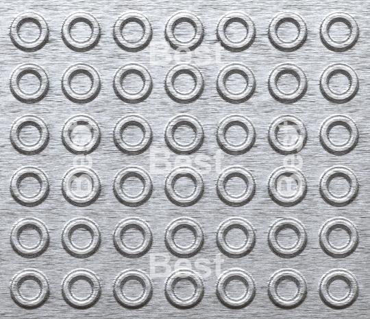 Metal texture background with embossed wheels.