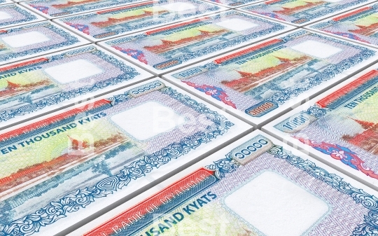 Myanmar kyat bills stacked background