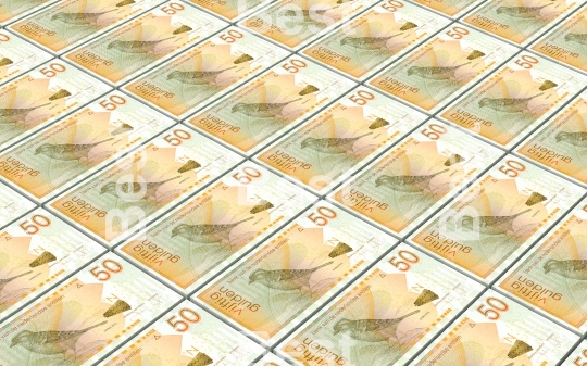 Netherlands Antillean guilder bills stacked background