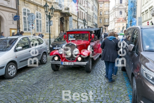 Old historic red car in Praga