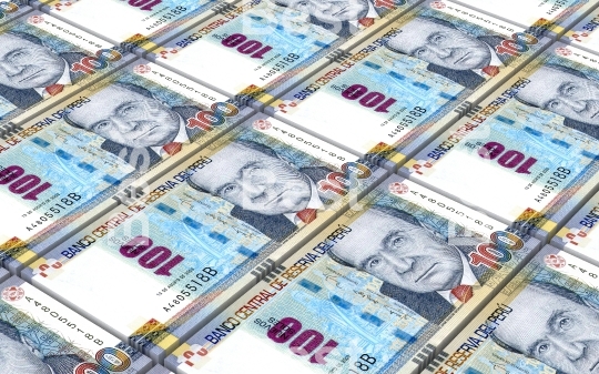 Peruvian nuevos soles bills stacks background