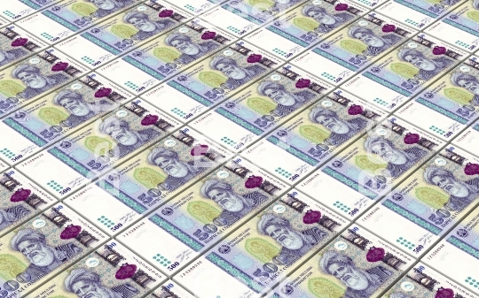 Tajikistani Somoni bills stacks background