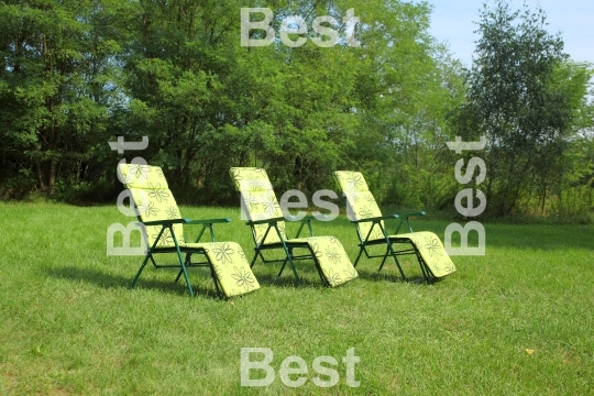 Three deck chairs