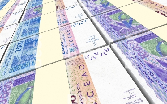 West African CFA francs bills stacked background