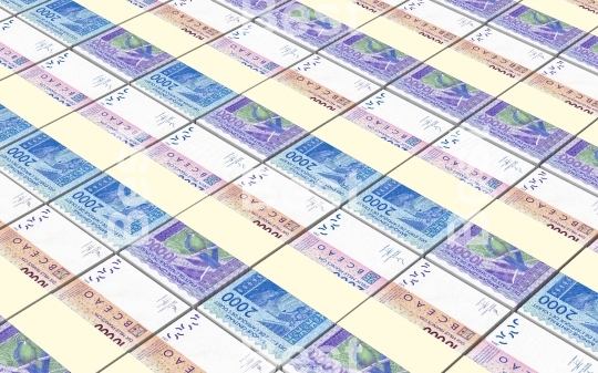 West African CFA francs bills stacked background