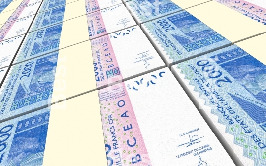 West African CFA francs bills stacked background