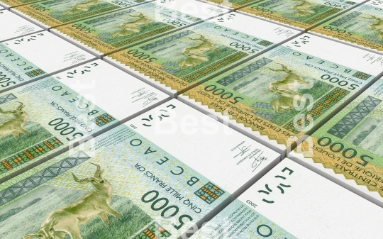 West African CFA francs bills stacks background