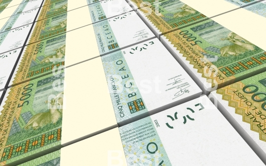 West African CFA francs bills stacks background
