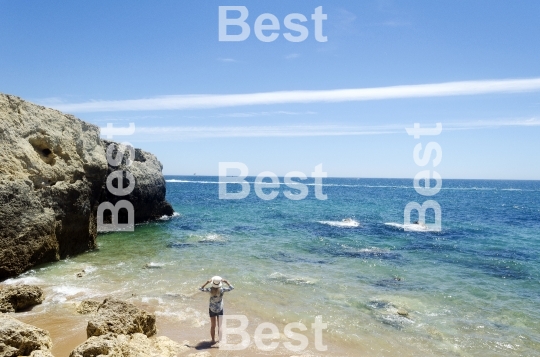 Woman standing on the beach