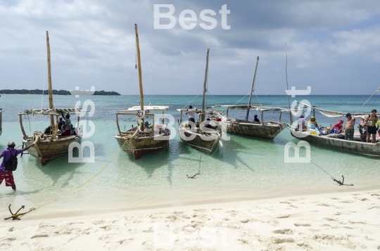 Wooden boats are waiting for tourists in Zanzibar