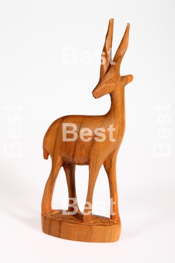 Wooden sculpture of antelopes