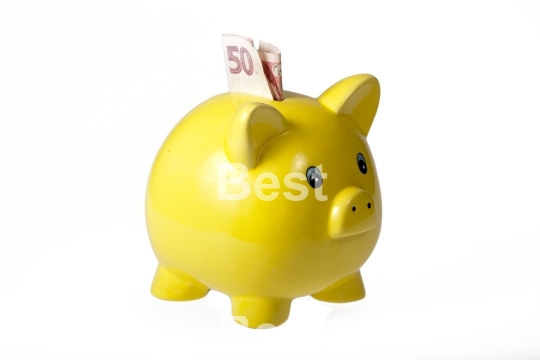 Yellow ceramic piggy bank with one bank note