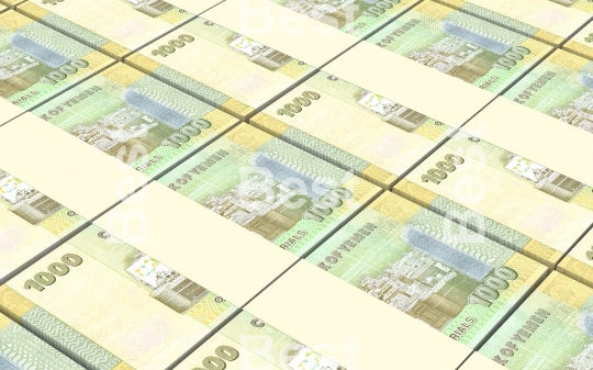 Yemeni rials bills stacks background