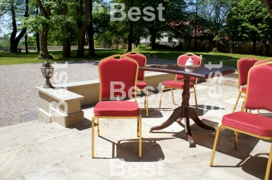 Chairs with tables on terrace